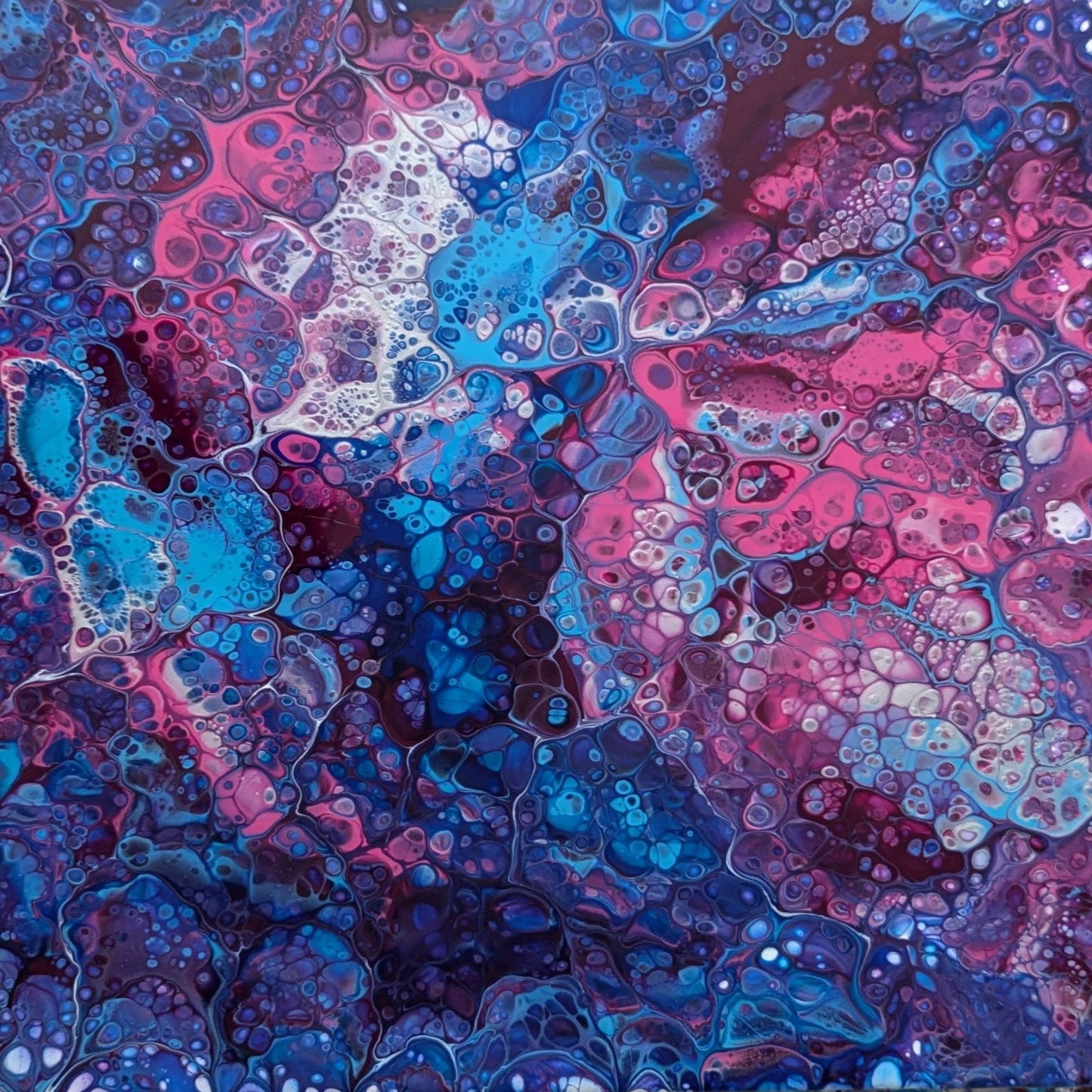 Abstract art with swirling blue and pink colors